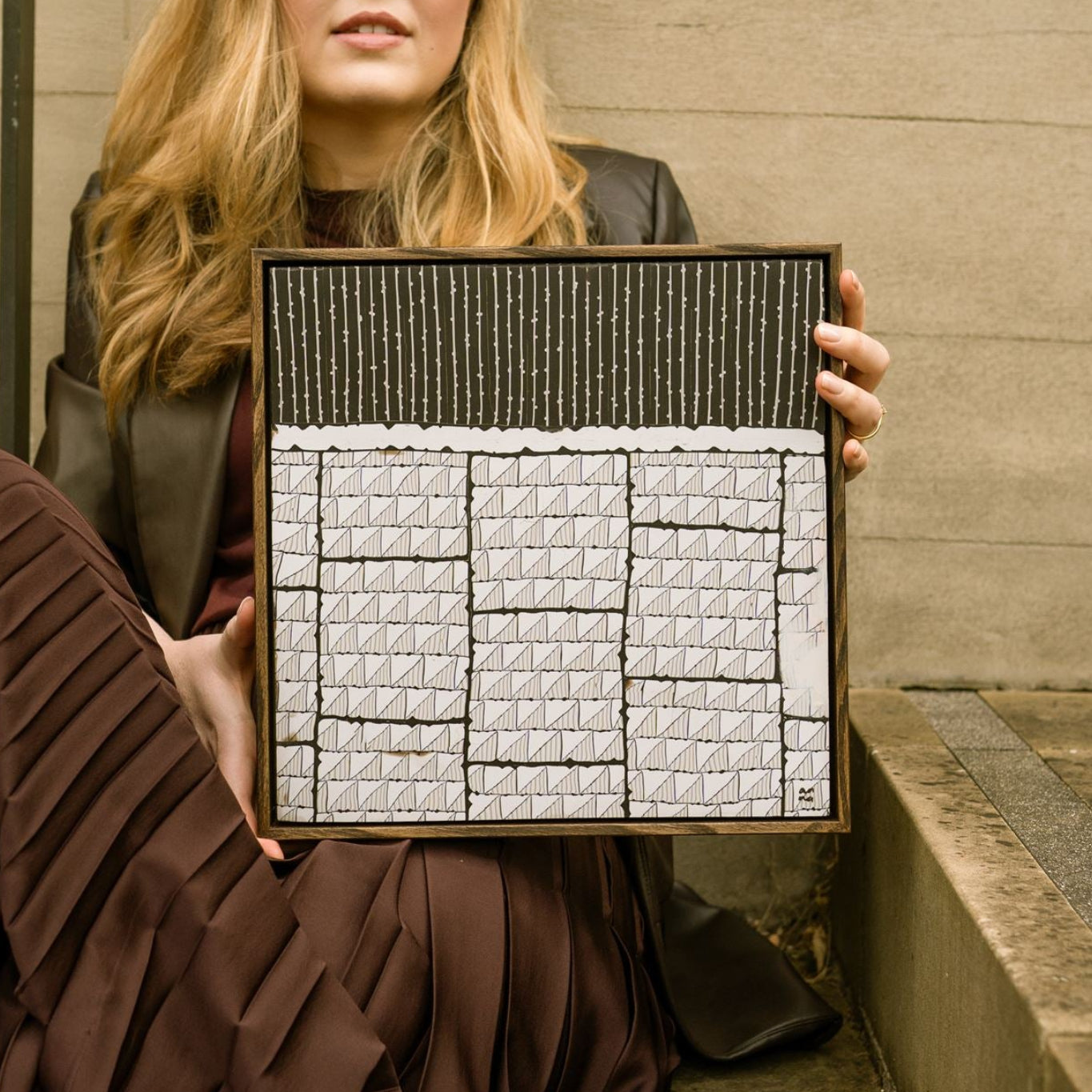 Steppe by Anna Mills, framed abstract polymer clay artwork with monochromatic geometric forms, repeating linear patterns and architectural composition.